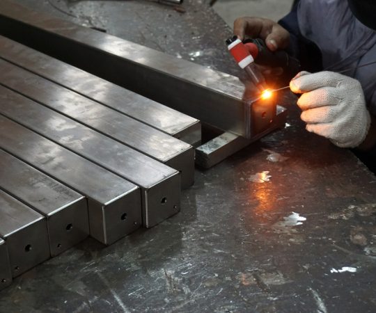 staff was welding stainless steel in the factory